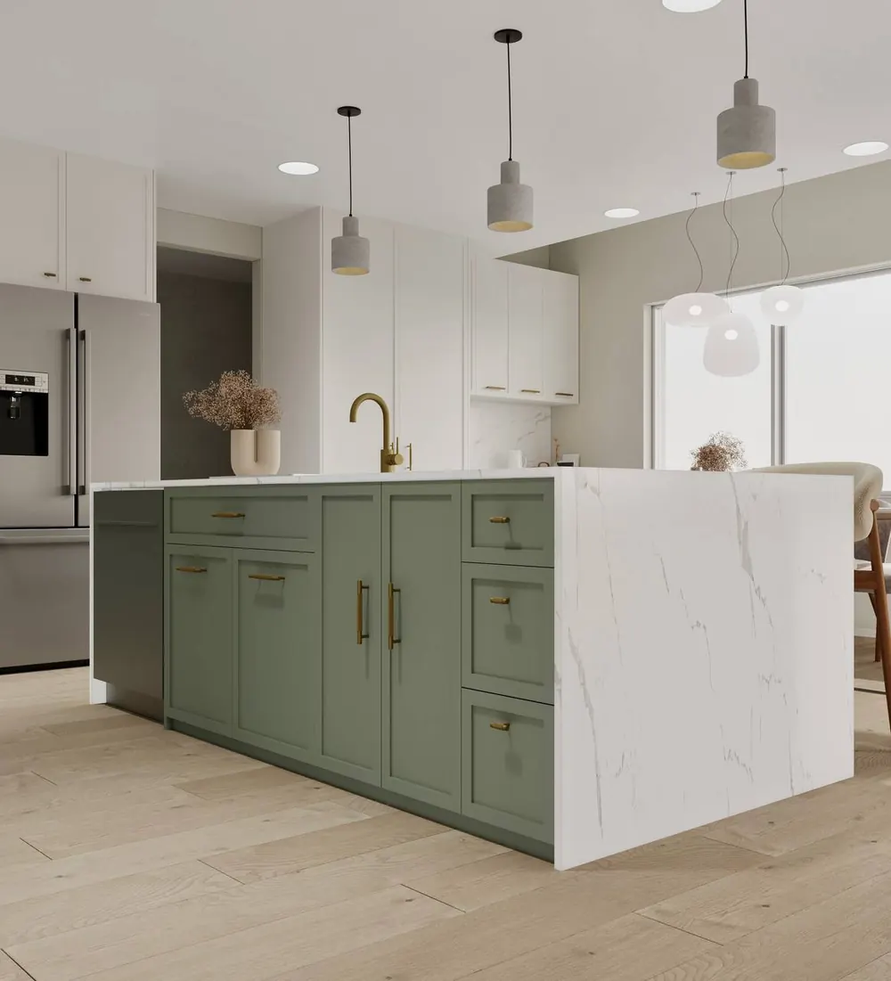 Sage-green island with a waterfall counter and concrete pendants