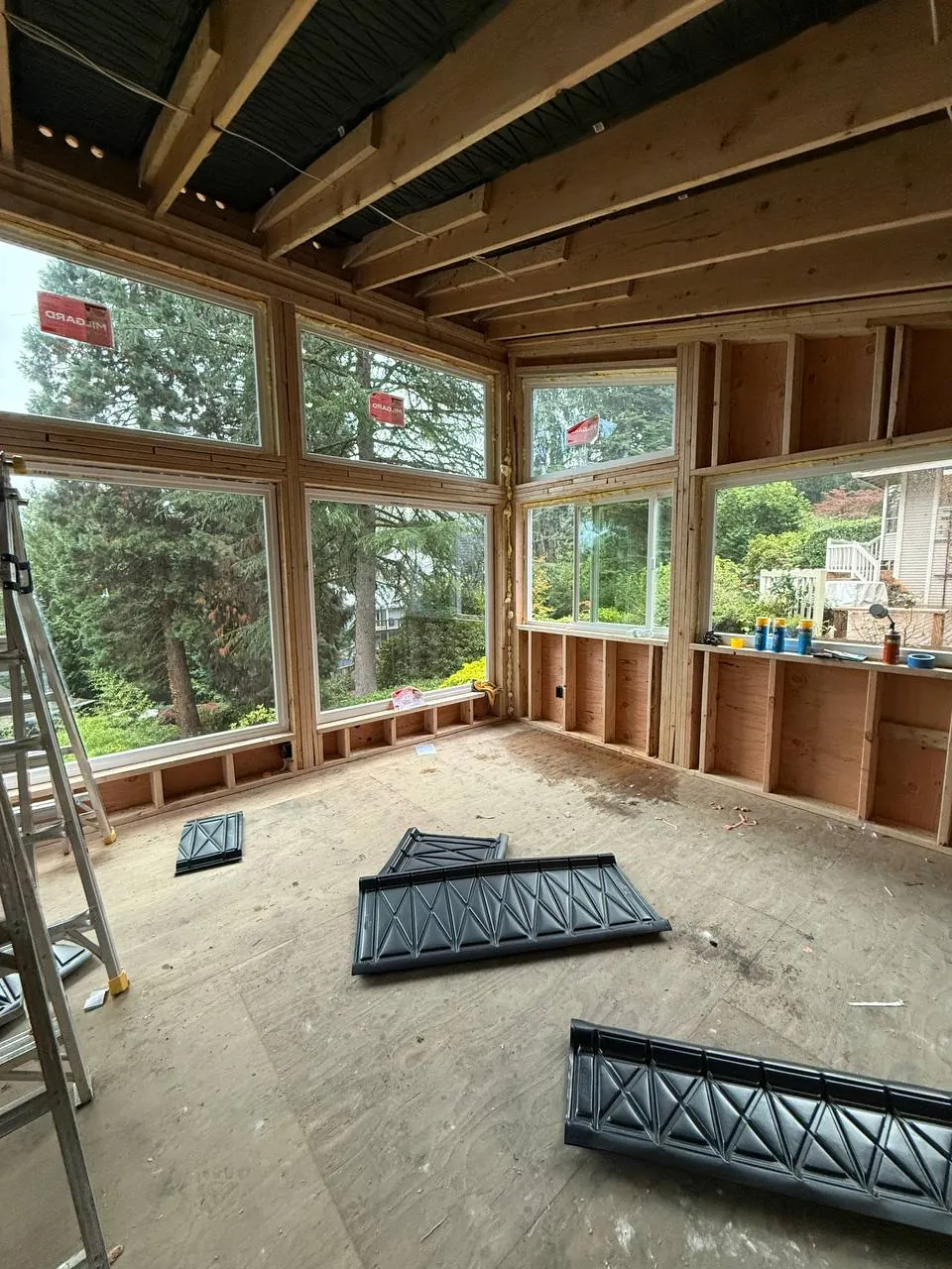 Framed walls and roof beams before drywall