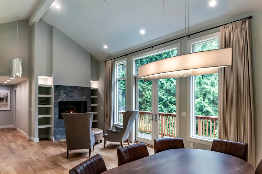 Open living and dining room with a vaulted ceiling