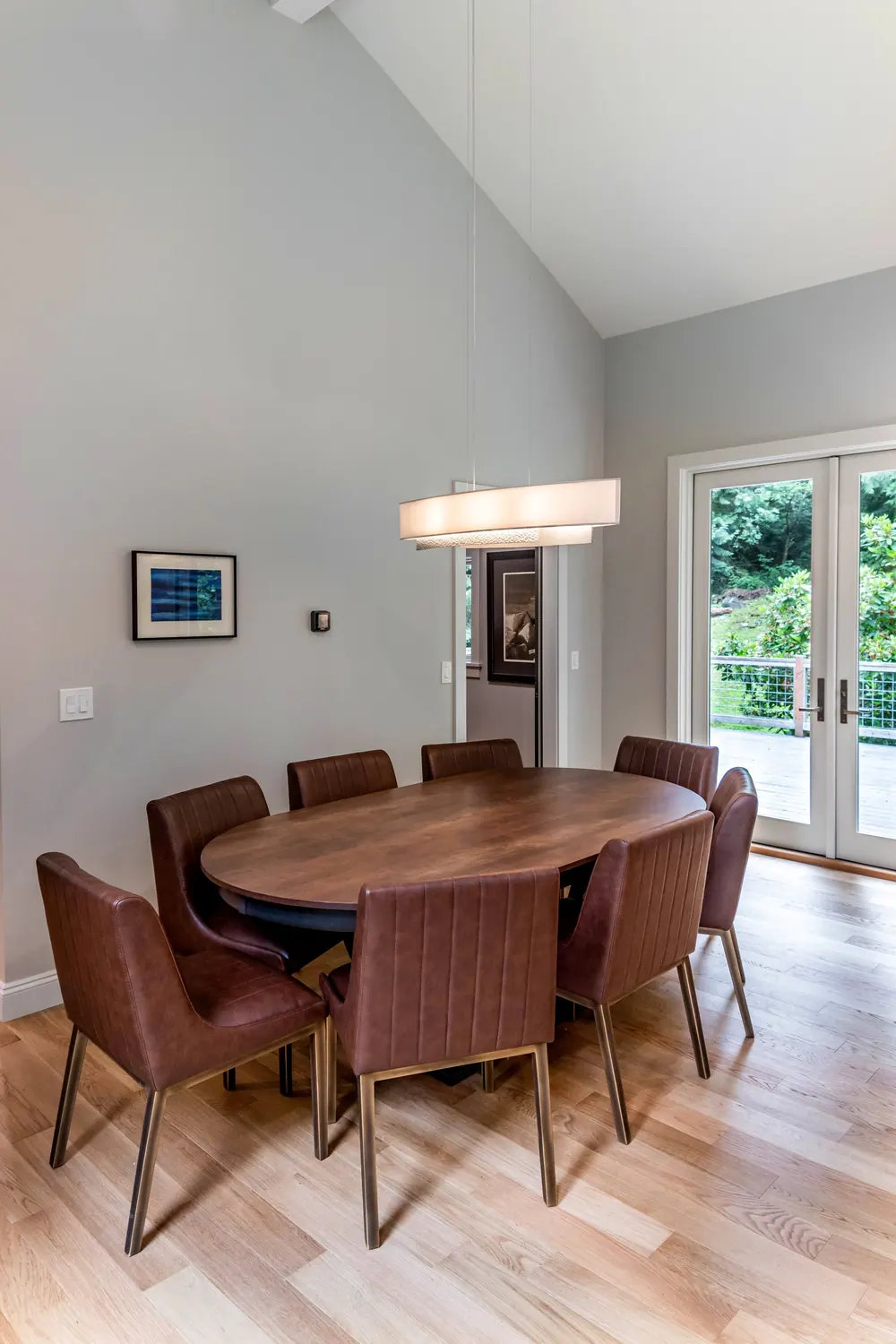 Dining table and chairs near the patio doors