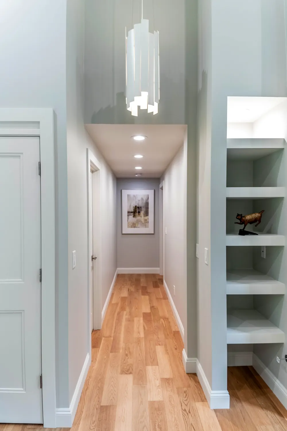 Hallway with built-in open shelves