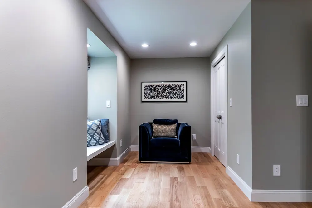 Bedroom reading corner with an armchair