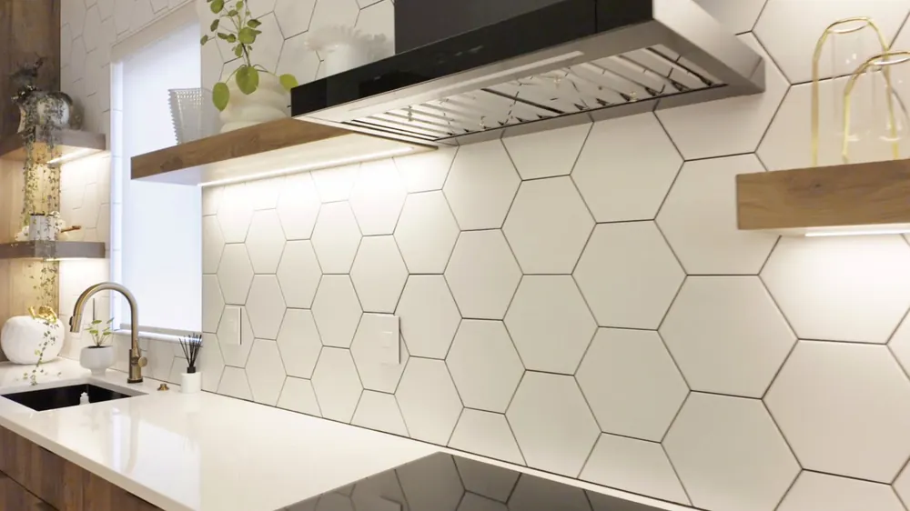 Hexagon 3D panel backsplash under a black range hood