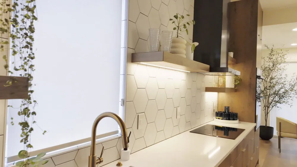 Kitchen sink with a hexagon panel backsplash